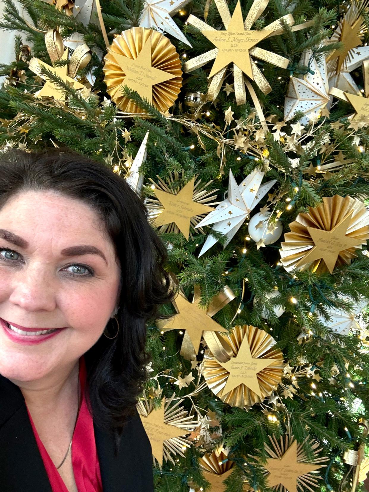 Mindy Shubert Geist of Edmond takes a selfie at the White House near a Gold Star-themed Christmas tree, which honors the men and women of America's military who have laid down their lives for the nation and the families who carry on their legacies.