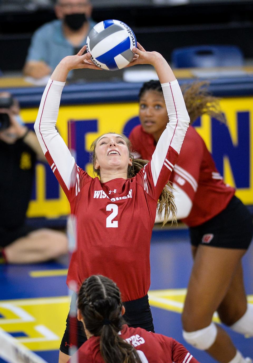 Wisconsin setter Sydney Hilley sets against Marquette in a September match.