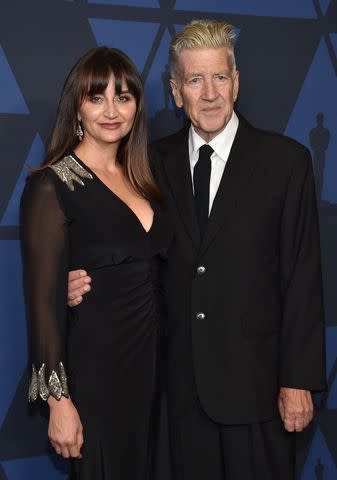 <p>CHRIS DELMAS/AFP via Getty </p> David Lynch and Emily Stofle arrive to attend the 11th Annual Governors Awards gala at the Dolby Theater in Hollywood on October 27, 2019.