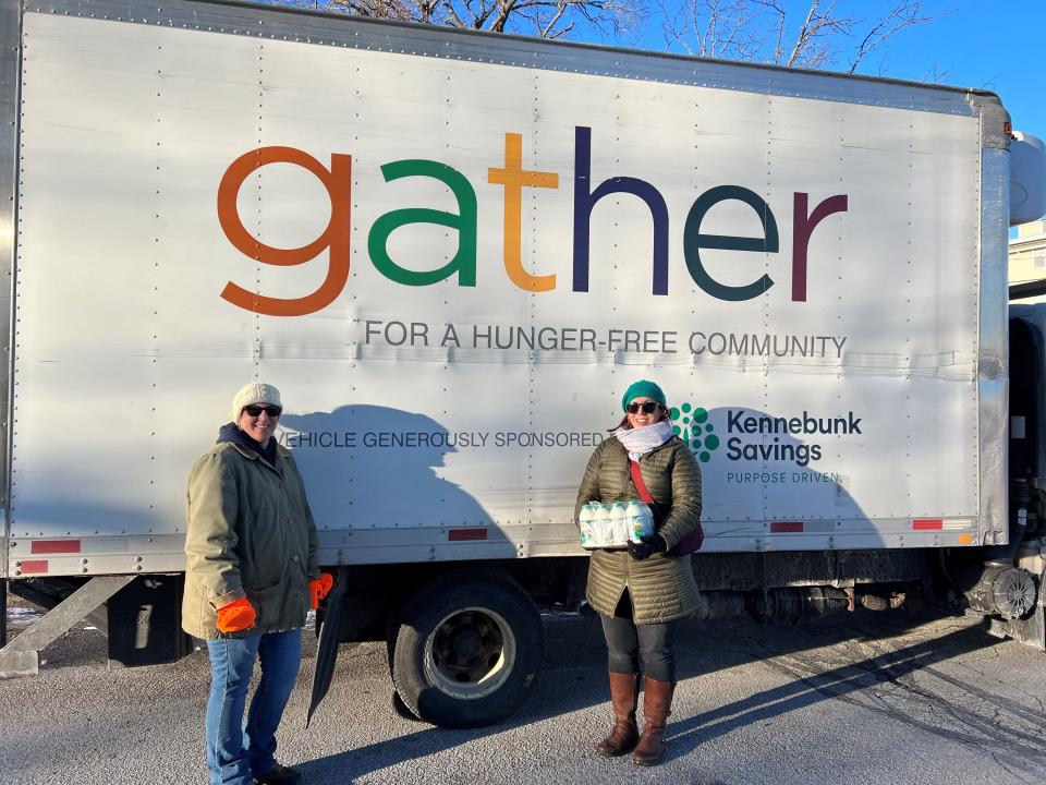 Nikki Leavitt, Mobile Programs Coordinator for Gather, left, and Becca Story, Senior Nutrition Specialist at New England Dairy, oversee the donation from dairy farmers.