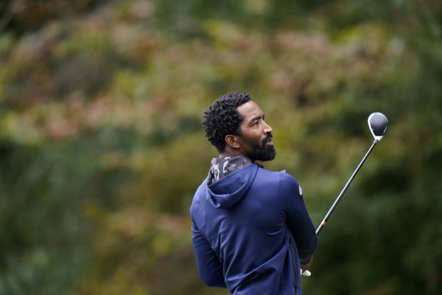 North Carolina A&T's J.R. Smith watches a tee shot on the 18th hole during the first round of the Phoenix Invitational golf tournament in Burlington, N.C., Monday, Oct. 11, 2021. Smith, who spent 16 years in the NBA made his college golfing debut in the tournament hosted by Elon. (AP Photo/Gerry Broome)