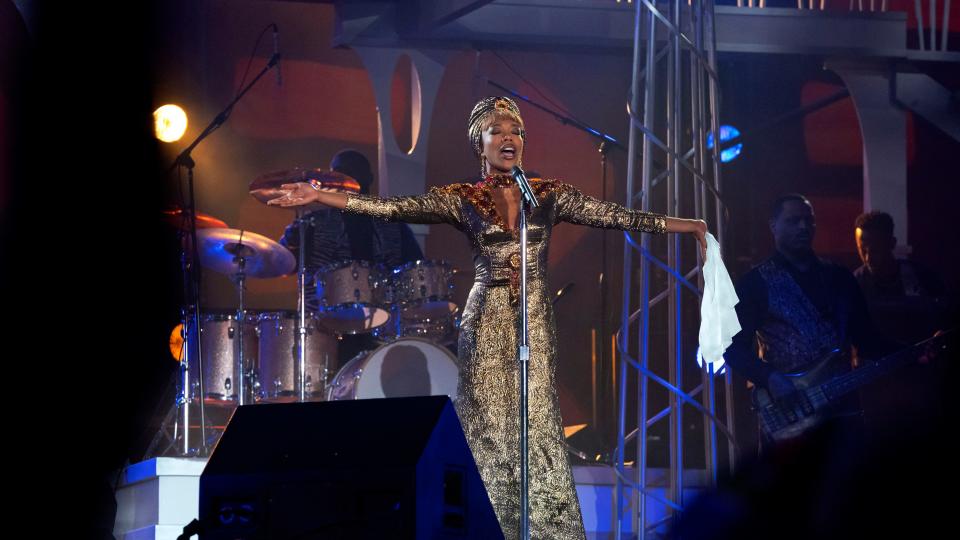 Naomi Ackie transforms into Whitney Houston as she performs in "I Wanna Dance With Somebody," the Houston biopic produced by the singer's estate and mentor Clive Davis.