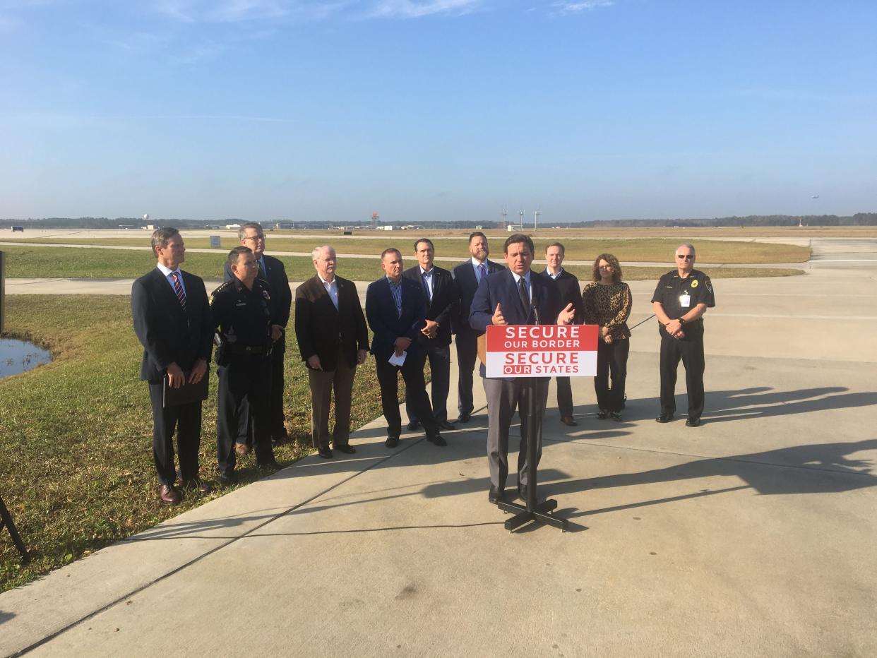 Florida Governor Ron DeSantis speaks during a news conference Friday, Dec. 10, 2021 at Jacksonville International Airport about his proposals for "securing our border."