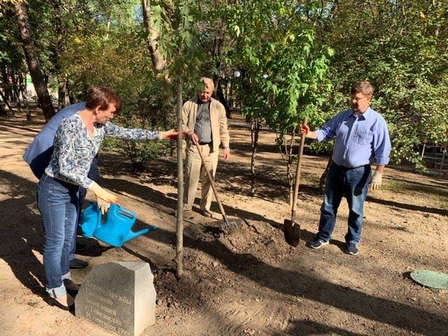Gainesville Mayor Lauren Poe plants trees with Russian citizens on his Sister City trip to Novorossiysk in 2019.