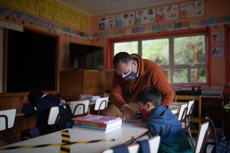 The Wider Image: Elon Musk's satellites beam internet into Chilean boy's life