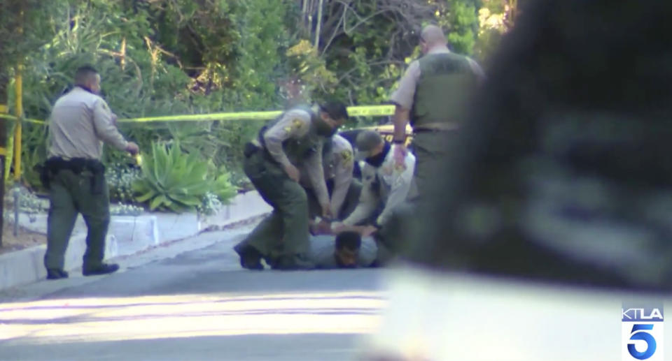 Police arrested Robert Cotton after he returned one of the victim's cars. Source: KTLA 