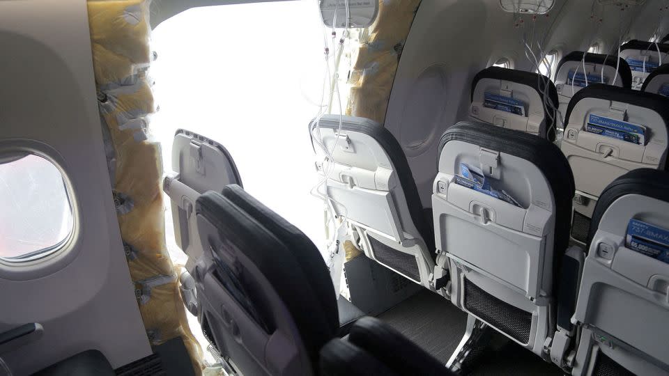 The door plug area of the Alaska Airlines Boeing 737 Max plane that was forced to make an emergency landing with a gap in the fuselage. - NTSB/Handout via Reuters