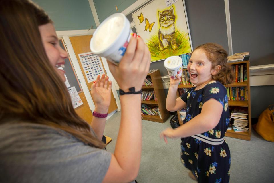 9/6/19 11:20:17 -- Portland, OR  -- Katharina (cq), left and Izzy, both 5th graders at Chapman Elementary School in Portland, Oregon, show off the flavor of ice cream they invented for Salt & Straw. Every year, Salt & Straw ice cream in Portland partners with local elementary schools for their 