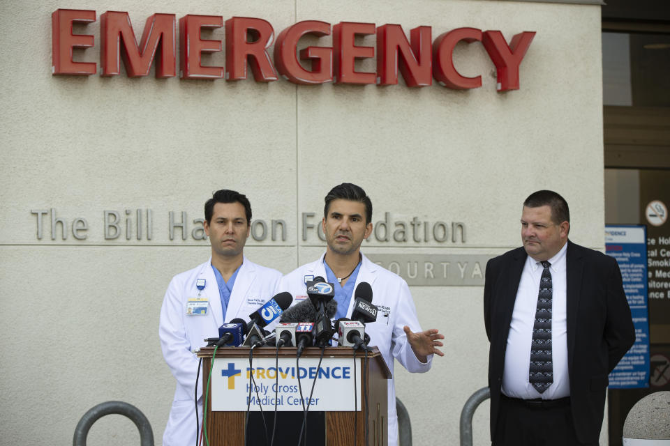 Doctors at Providence Holy Cross Hospital in Mission Hills tell reporters they treated a 15-year-old girl and a 14-year-old girl after Thursday's shooting at Saugus High School in Santa Clarita, during a news conference Friday, Nov. 15, 2019 in Los Angeles. The suspected gunman shot five students, seemingly at random, and then shot himself in the head and remains in critical condition Friday. (AP Photo/Damian Dovarganes)