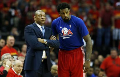 DeAndre Jordan (right) called Clippers coach Doc Rivers to express reservations about joining the Mavs. (Getty Images_