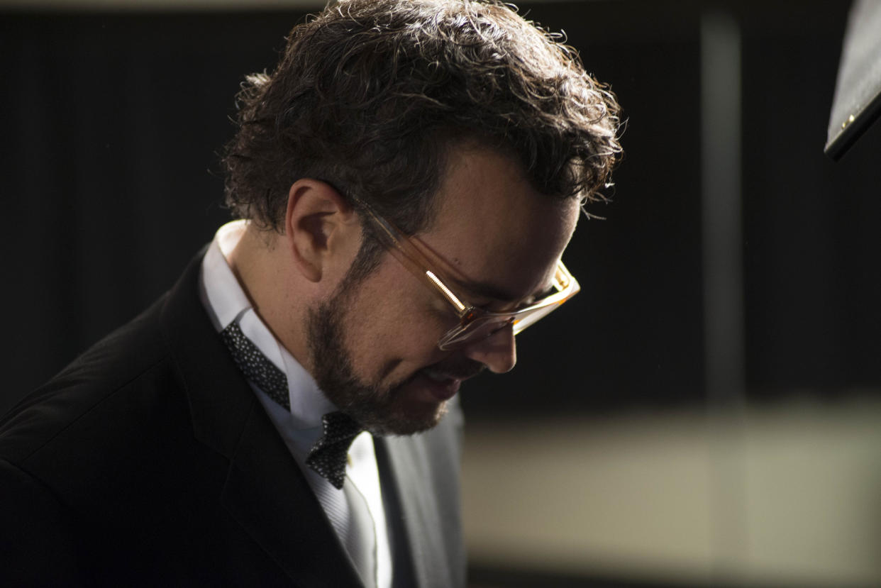 Mexican singer Aleks Syntek attends a press conference to promote his newest album, "Romantico Desliz," at the W Hotel in Mexico City, Friday, June 27, 2014. Syntek has been a professional musician for 25 years and "Romantico Desliz," is his 10th album. (AP Photo/Sean Havey)