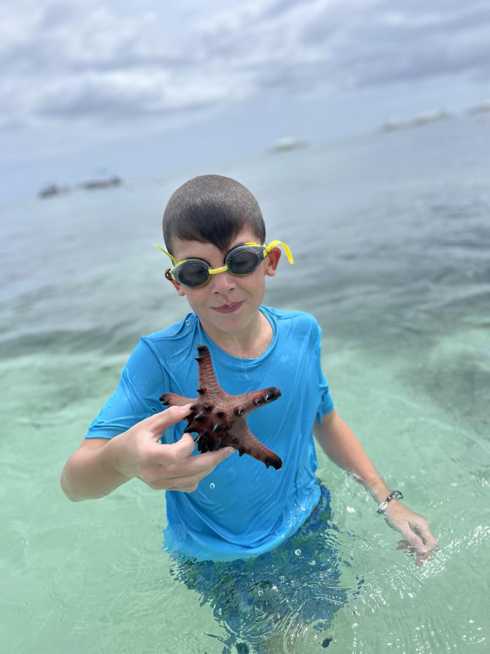 Lisa's son pictured in the Philippines. By the end of the trip, her two boys were keen to get back to school. (Supplied) 