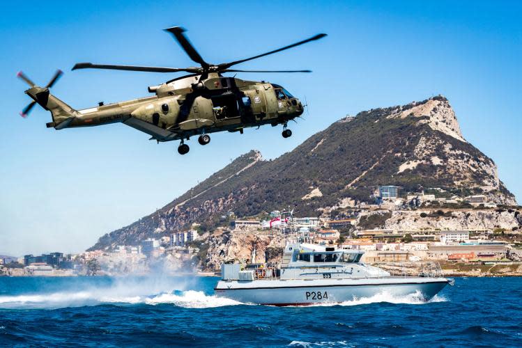 <p>An Mk3 helicopter flies over Gibraltar (MoD) </p>