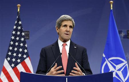 U.S. Secretary of State John Kerry addresses a news conference during a NATO foreign ministers meeting at the Alliance headquarters in Brussels December 3, 2013. REUTERS/Francois Lenoir