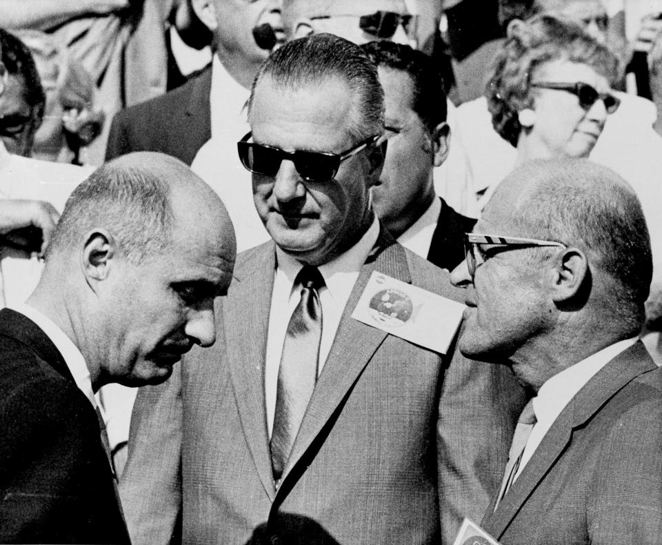 FILE - Vice President Spiro T. Agnew, center, Apollo 10 Commander Tom Stafford, left, and Al Siepert, deputy director of the Kennedy Space Center, stand together at Cape Kennedy after watching the lift-off of the Apollo 11 flight carrying the first men to the moon, July 16, 1969. Astronaut Thomas P. Stafford, who commanded a dress rehearsal flight for the 1969 moon landing and the first U.S.-Soviet space linkup, died Monday, March 18, 2024. He was 93. (AP Photo/Pool, file)