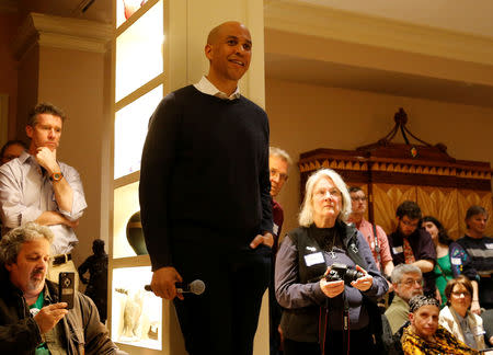 U.S. 2020 Democratic presidential candidate and Senator Cory Booker smiles as he listens to a question as he campaigns at a Amherst House Party in Amherst, New Hampshire, U.S., April 6, 2019. REUTERS/Mary Schwalm