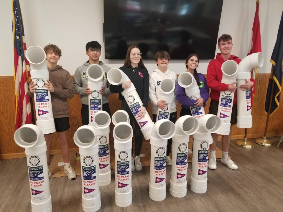 Shown with the Monroe Boat Club Association's completed fishing line recycling bins are (from left): Trent Miller, Enzo Collino, Kira Goldsmith, Ezra Powell, Ava Collino and Kyle Goldsmith.