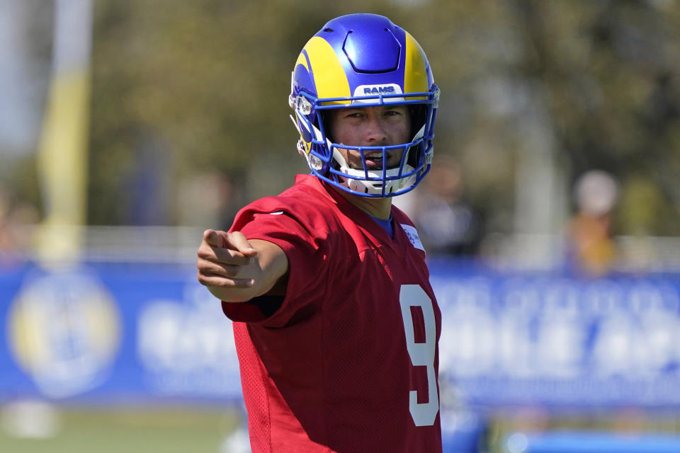 Los Angeles Rams quarterback Matthew Stafford signals during practice at NFL football training camp Wednesday, July 28, 2021, in Irvine, Calif. (AP Photo/Marcio Jose Sanchez)