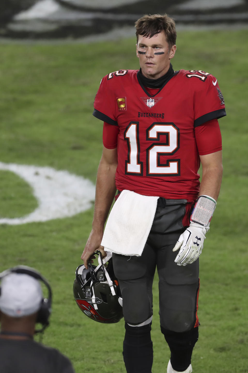 Tampa Bay Buccaneers quarterback Tom Brady (12) reacts as he walks to the bench after throwing an interception to Kansas City Chiefs cornerback Rashad Fenton during the second half of an NFL football game Sunday, Nov. 29, 2020, in Tampa, Fla. (AP Photo/Mark LoMoglio)