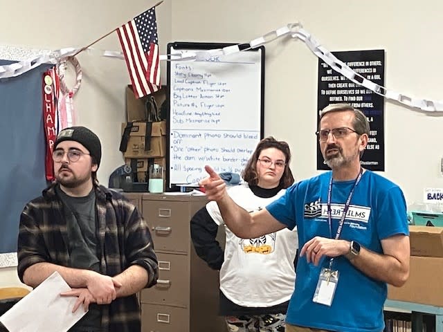 Fresh Films instructor and Davenport Central art department chair Clint Balsar (right) works with program participants at Central Thursday, Jan. 25, 2024 (photo by Jonathan Turner).