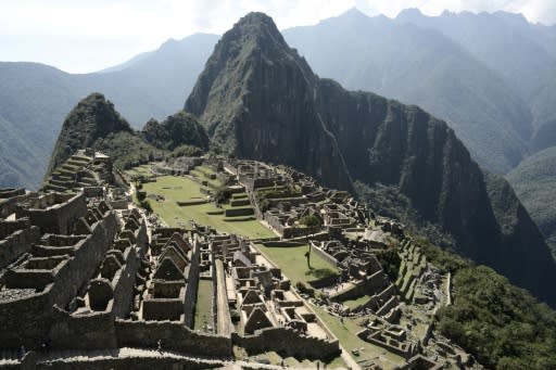 The Historic Sanctuary of Machu Picchu is embedded within a dramatic landscape at the meeting point between the Peruvian Andes and the Amazon Basin