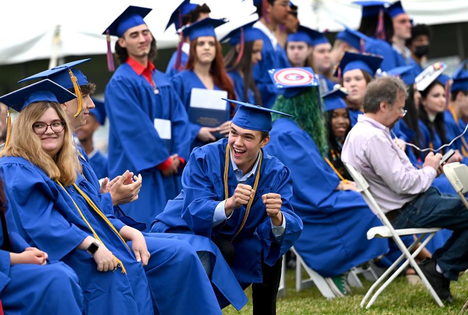 Graduates get excited as they prepare to receive their diplomas during Keefe Regional Technical School's graduation at the Warren Conference Center and Inn in Ashland, June 2, 2022.