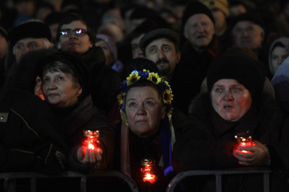 Anti-Yanukovych protesters attend a rally at Kiev's Independence Square, the epicenter of the country's current unrest, Ukraine, Wednesday, Feb. 26, 2014. Ukraine has been consumed by a three-month-long political crisis. President Viktor Yanukovych and protest leaders signed an agreement last week to end the conflict that left more than 80 people dead in just a few days in Kiev. Shortly after, Yanukovych fled the capital for his powerbase in eastern Ukraine but his exact whereabouts are unknown. (AP Photo/Marko Drobnjakovic)