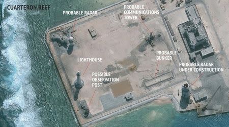 A satellite image released by the Asian Maritime Transparency Initiative at Washington's Center for Strategic and International Studies shows construction of possible radar tower facilities in the Spratly Islands in the disputed South China Sea in this image released on February 23, 2016. REUTERS/CSIS Asia Maritime Transparency Initiative/DigitalGlobe/Handout via Reuters