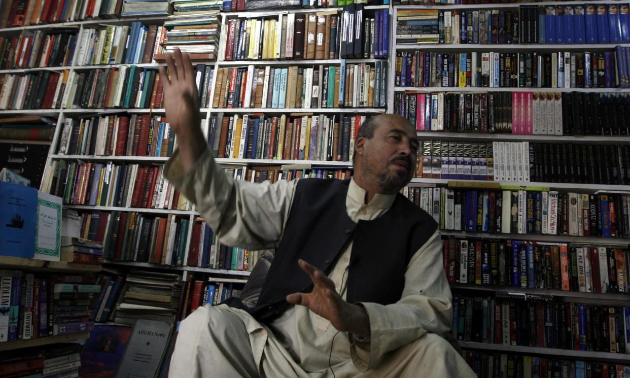 <span>Shah Mohammad Rais in his bookshop in Kabul in 2007.</span><span>Photograph: Musadeq Sadeq/AP</span>