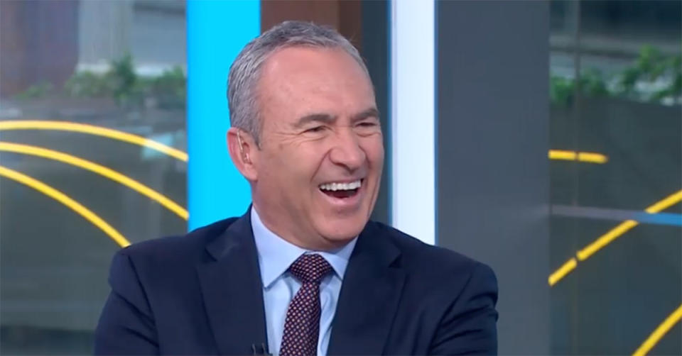 Sunrise host Mark Beretta laughs on set