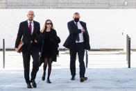 Former Fifa general secretary Jerome Valcke, right, arrives for the pronouncement of judgement at the Federal Criminal Court in Bellinzona, Switzerland,Friday, Oct. 30, 2020. Valcke is is accused of taking bribes, falsification of documents and aggravated criminal mismanagement. (Ti-Press/Alessandro Crinari/Keystone via AP)