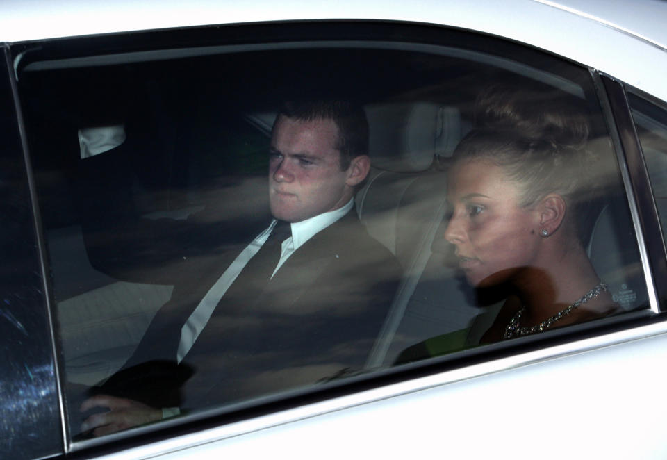 British footballer Wayne Rooney and girlfriend Coleen McLoughlin arrive for a pre-World Cup party at the Herfordshire home of David and Victoria Beckham in southern England May 21, 2006. WORLD CUP 2006 PREVIEW REUTERS/Luke MacGregor