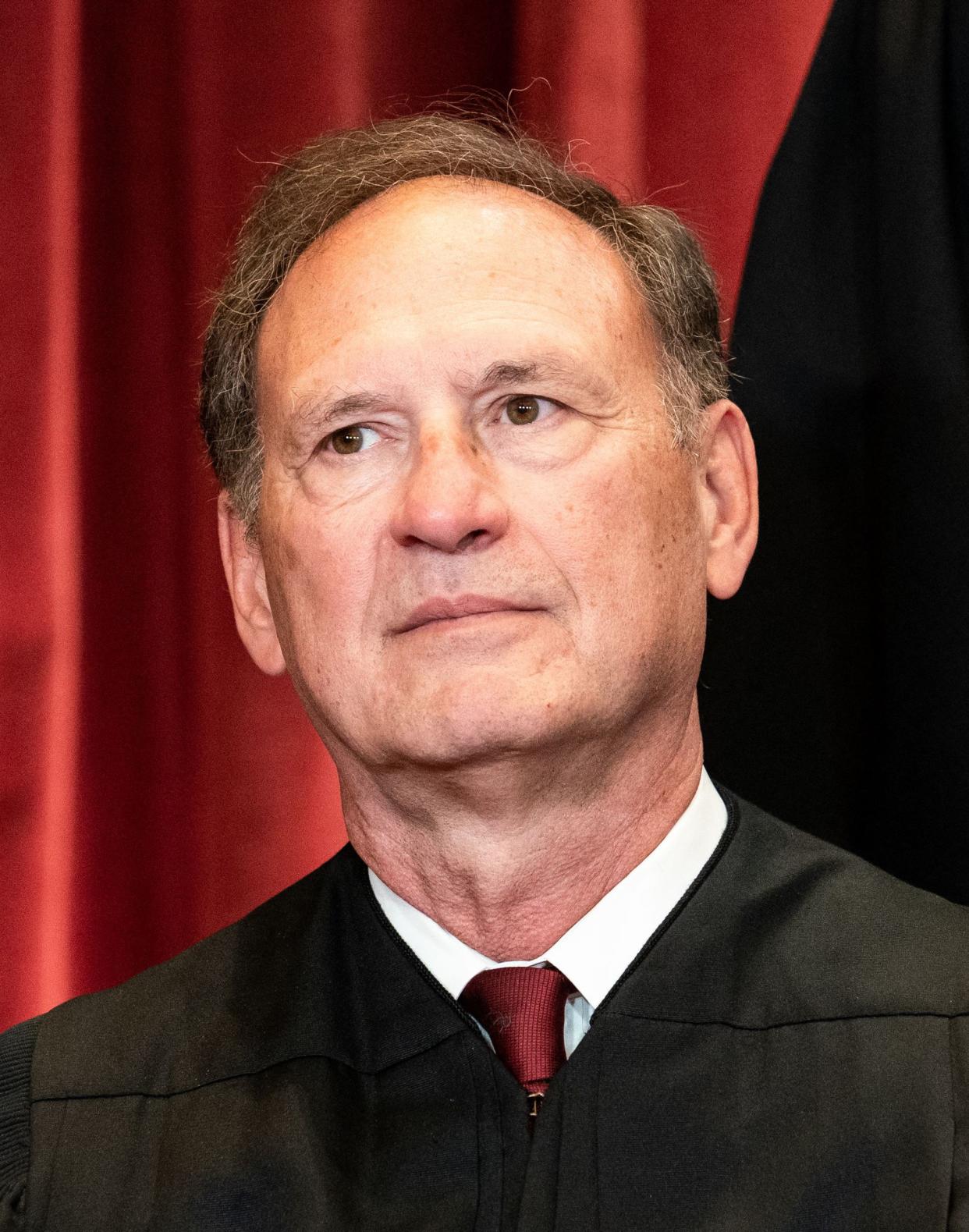 Associate Justice Samuel Alito sits during a group photo of the Justices at the Supreme Court in Washington, DC on April 23, 2021. 