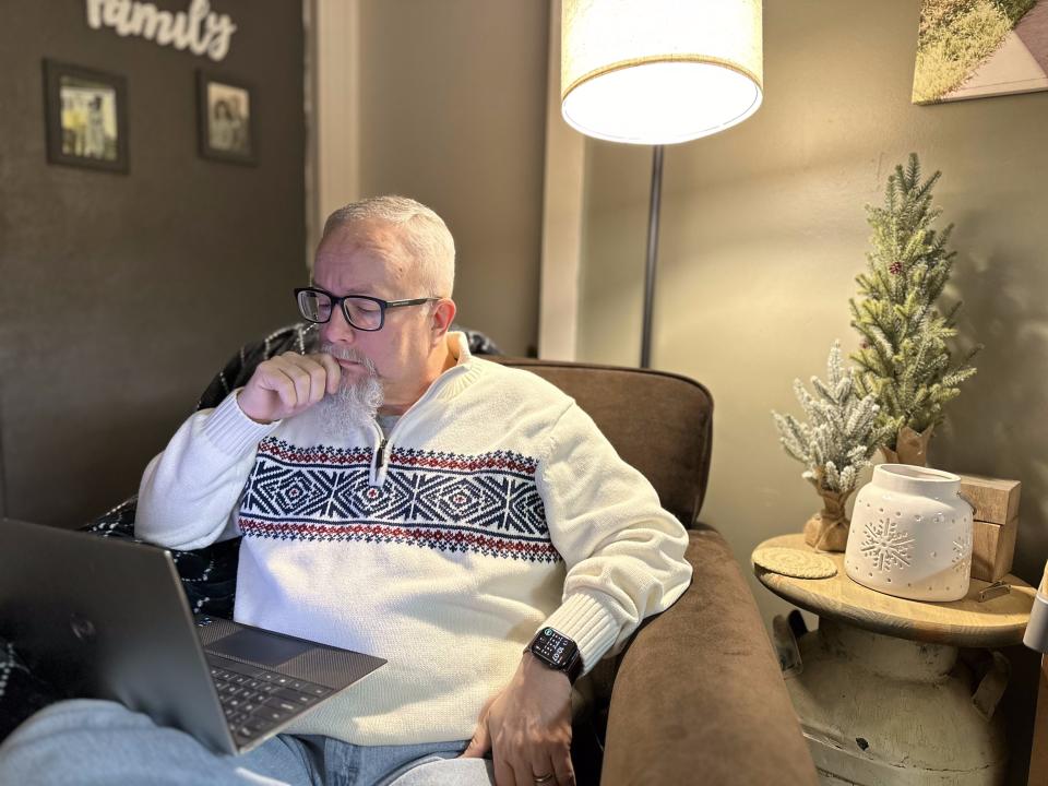 Pastor Michael Demastus sits at his laptop at home in Des Moines, Iowa on Friday, January 12, 2024. | Sam Benson, Deseret News