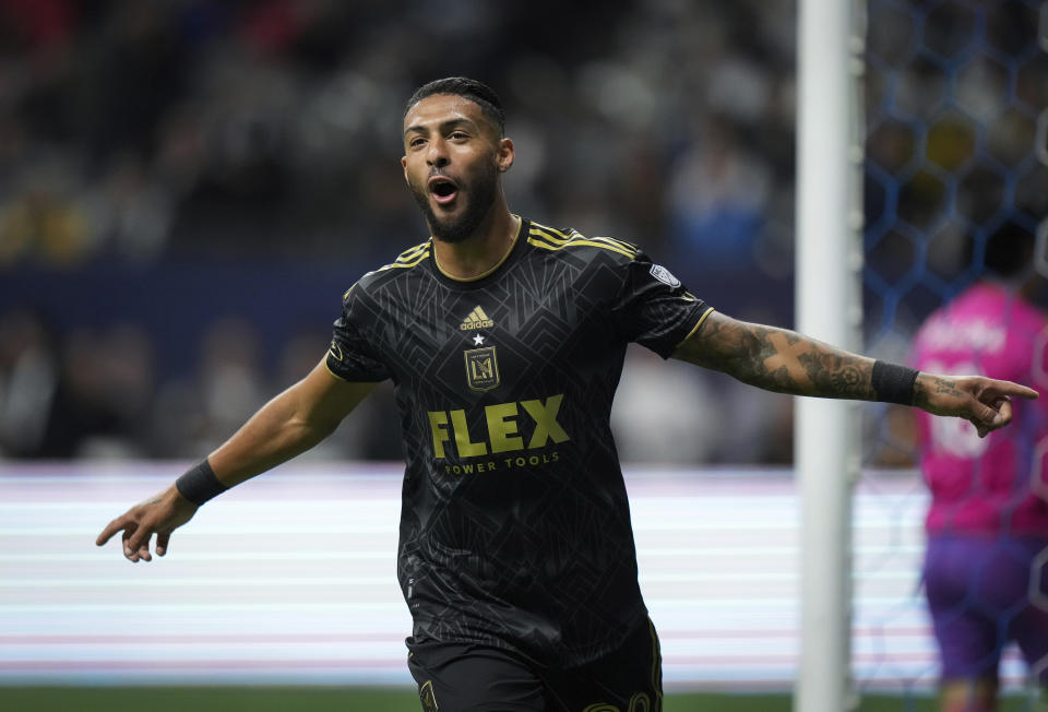 Los Angeles FC's Denis Bouanga celebrates his goal against the Vancouver Whitecaps during the first half of an MLS soccer match, in Vancouver, British Columbia, Saturday, Oct. 21, 2023. (Darryl Dyck/The Canadian Press via AP)