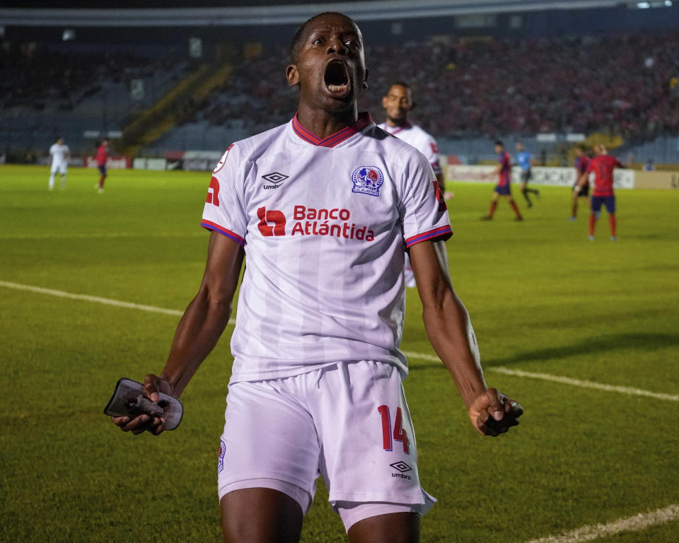 Boniek Garcia of Honduras' Olimpia celebrates scoring his side' second goal against Guatemala's Municipal during a CONCACAF League soccer match in Guatemala City, Thursday, Aug. 18, 2022. (AP Photo/Moises Castillo)