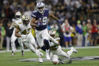 Dallas Cowboys wide receiver Amari Cooper (19) runs against New Orleans Saints cornerback P.J. Williams (26) during the first half of an NFL football game, Thursday, Dec. 2, 2021, in New Orleans. (AP Photo/Brett Duke)