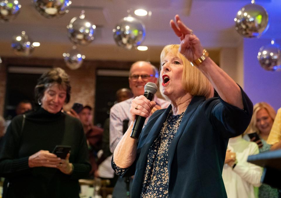 Vanderburgh County Democratic Party Chair Cheryl Schultz announces the candidate victories during a democratic election watch party at City View at Sterling Square in Evansville, Ind., Tuesday, Nov. 7, 2023.