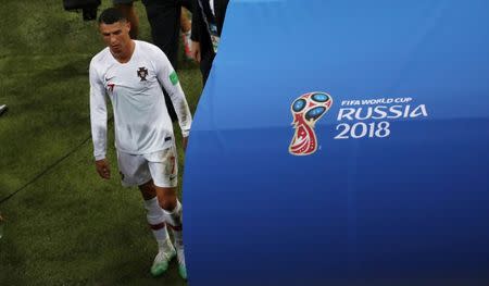Soccer Football - World Cup - Round of 16 - Uruguay vs Portugal - Fisht Stadium, Sochi, Russia - June 30, 2018 Portugal's Cristiano Ronaldo looks dejected as he walks off the pitch after the match REUTERS/Sergio Perez