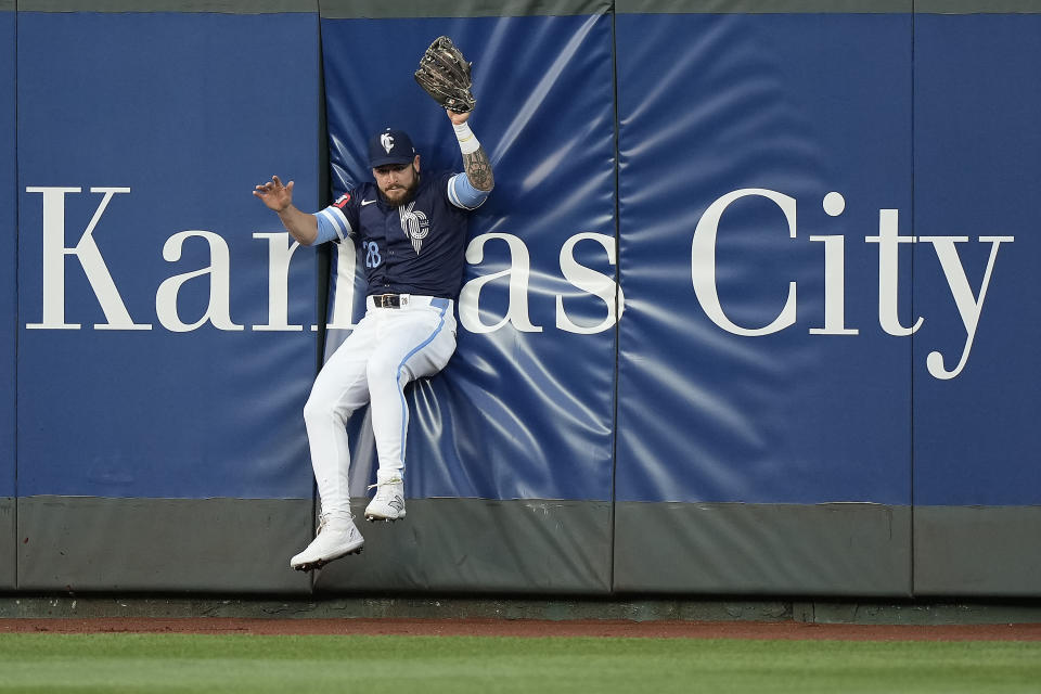 Kansas City Royals center fielder Kyle Isbel catches a fly ball for the out on Baltimore Orioles' Ryan O'Hearn during the fourth inning of a baseball game Friday, April 19, 2024, in Kansas City, Mo. (AP Photo/Charlie Riedel)