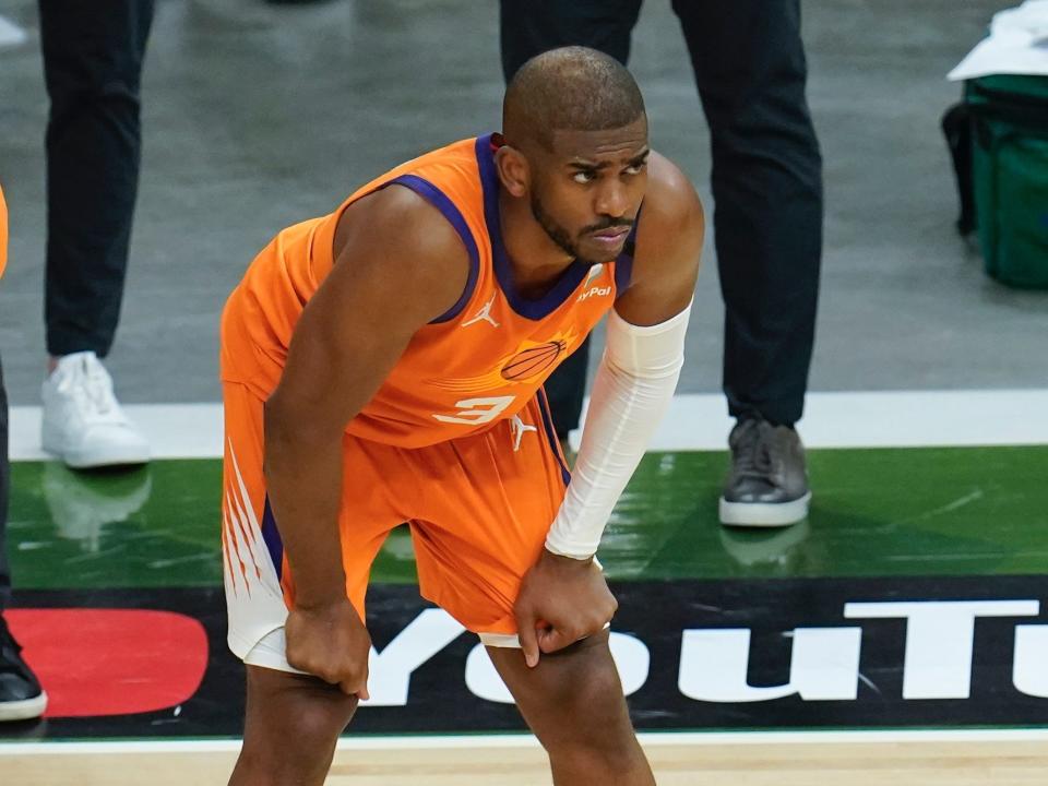 Chris Paul puts his hands on his knees during an NBA Finals game.