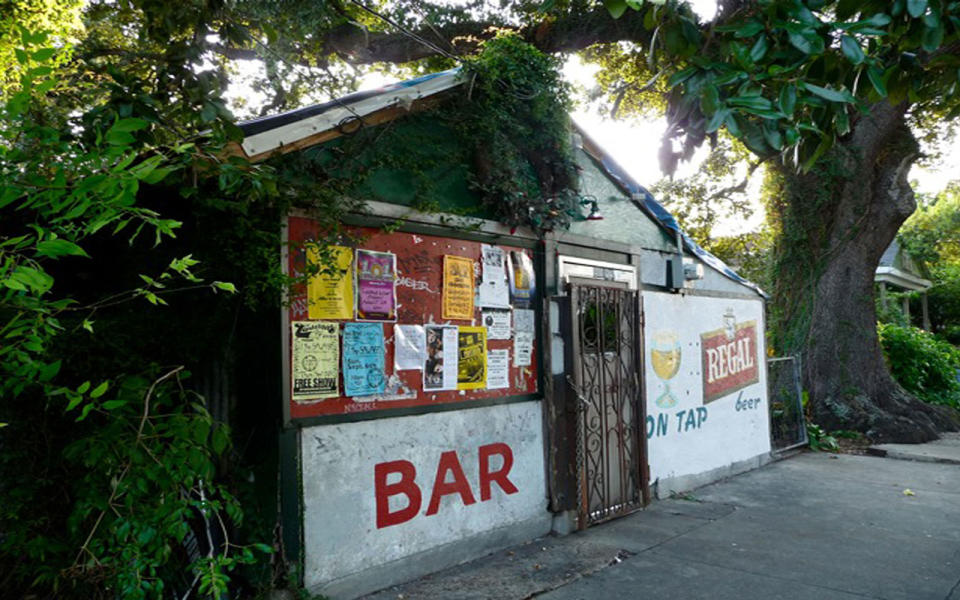 <p>A tree-shaded neighborhood joint in New Orleans’ Uptown, <a rel="nofollow noopener" href="http://www.snakeandjakes.com/" target="_blank" data-ylk="slk:Snake and Jake’s;elm:context_link;itc:0;sec:content-canvas" class="link ">Snake and Jake’s</a> looks, well, a little bit like a shack. With a faded wreath over the door and an interior lit only by Christmas-tree lights, it’s also a classic dive where every day is Christmas—especially on Christmas. It’s served the likes of Anthony Bourdain, Bette Midler, and George Clooney, but the best part about this bar is its unpretentious neighborhood vibe. Try their signature drink, the Possum Drop: it’s a pint of Schlitz with a shot of Jagermeister.</p> <p><strong>Where: </strong>7612 Oak Street</p> <p><strong>When: </strong>7 p.m. to 7 a.m.</p>