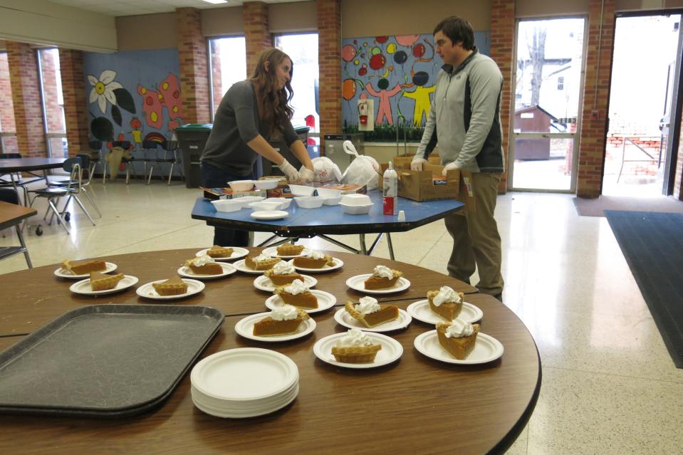 Pumpkin pie slices sit ready for guests as volunteers assemble to-go Thanksgiving meals Nov. 28, 2019, that will be delivered to homebound residents at the 21st annual free Thanksgiving dinner hosted by the Kiwanis Club of Adrian, Alpha Koney Island and Adrian Public Schools.