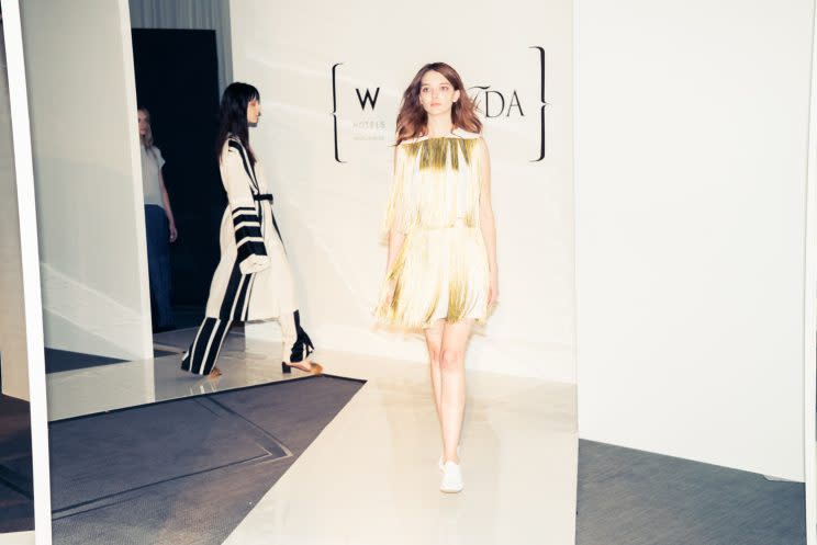 A model walks the runway in Ji Oh&#39;s fringed dress at the W/CFDA Showcase in Dallas. (Photo: Courtesy of CFDA + W Hotels)
