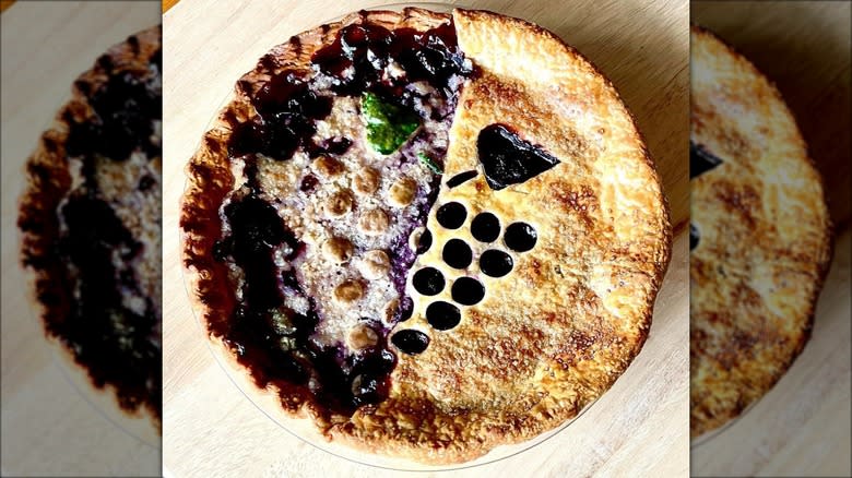 Grape pie on table