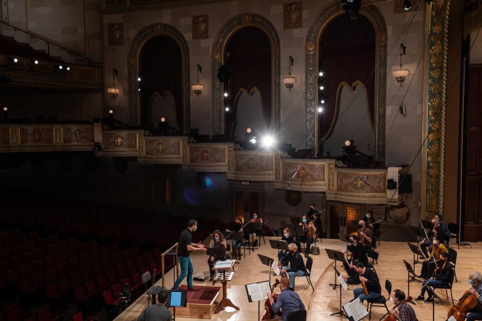 Music director Jader Bignamini leads a masked, scaled-down DSO at an otherwise empty Orchestra Hall in Detroit on Dec. 10, 2020, in preparation for a streaming-only concert.