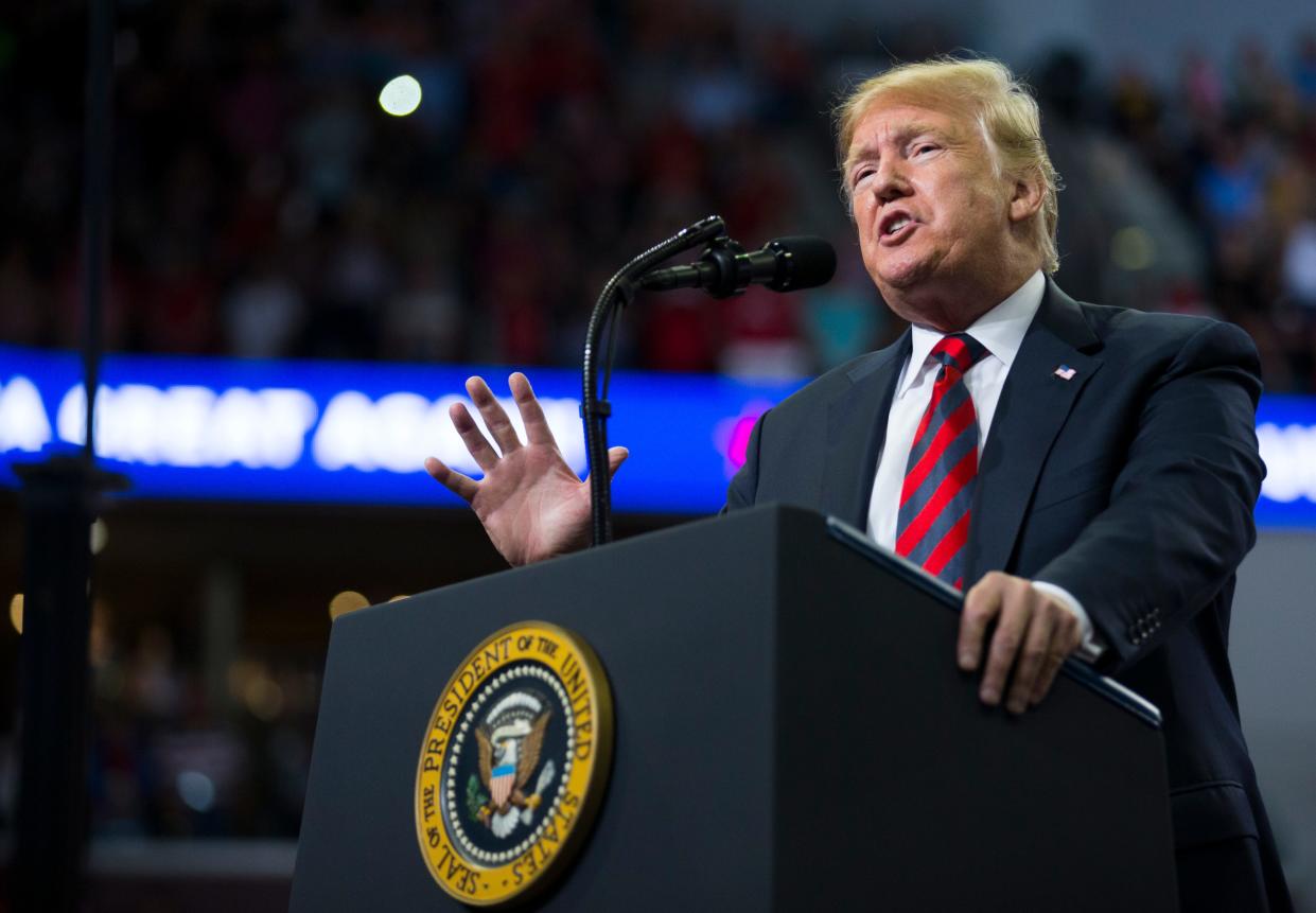 President Donald Trump speaks at a rally at JQH Arena in Springfield on Friday, Sept. 21, 2018