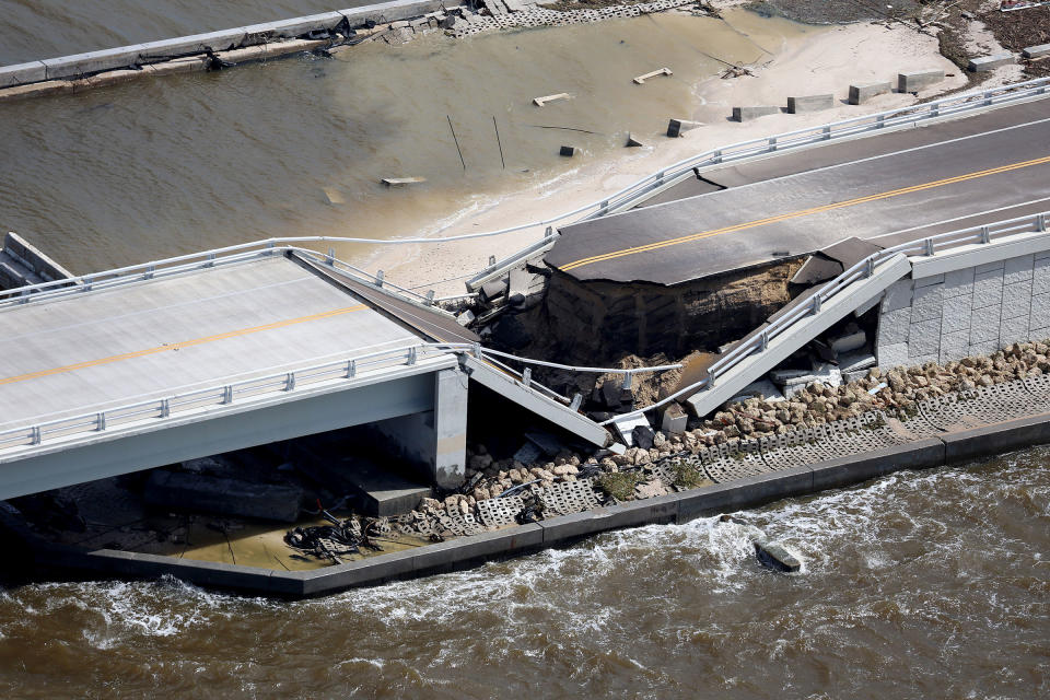 Parts of Sanibel Causeway are washed away along with sections of the bridge after Hurricane Ian passed through the area on Sept. 29, 2022, in Sanibel, Fla.<span class="copyright">Joe Raedle—Getty Images</span>