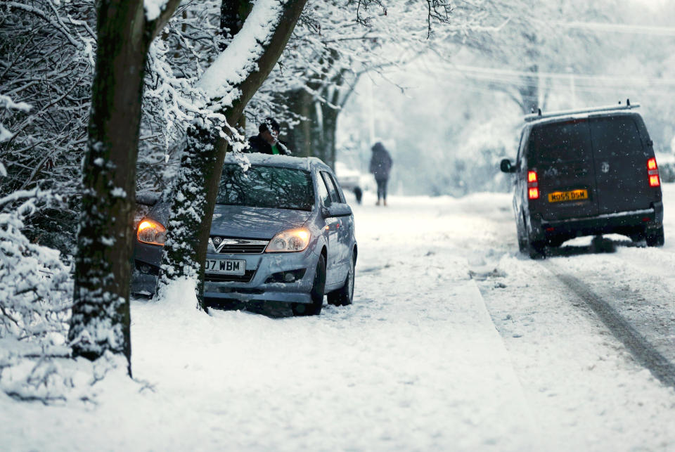 STOURBRIDGE, ENGLAND - DECEMBER 28: Cars abandoned as heavy snowfall falls down on the West Midlands overnight on December 28, 2020 in Stourbridge, England. Heavy snow fall has covered the West Midlands as the Met Office issues yellow warnings throughout the day. (Photo by Cameron Smith/Getty Images)