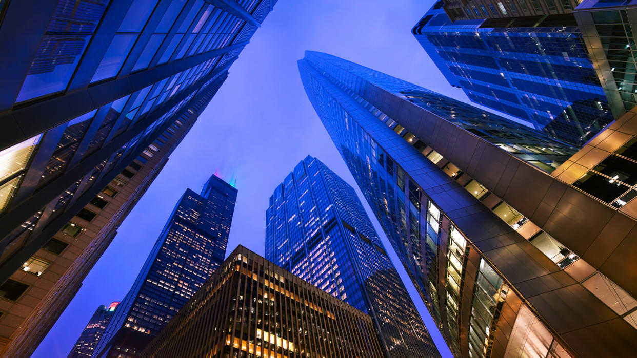 Looking up at Chicago's skyscrapers in financial district at dusk, IL, USA - Image.